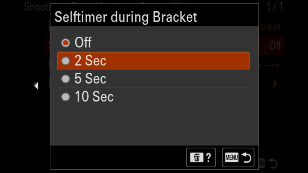 How To Add A Shutter Delay When Shooting a Bracket Of Any Kind? This setting can be found in the "Shooting" menu under "5: Drive Mode". Look for "Bracket Settings" before seeing "Self-timer during Bracket" and turning it on. For the Sony a1 II by Colby Brown Photography